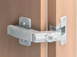 Blum 60° knock-in bi-fold corner cabinet hinge for smooth corner cabinet door operation.